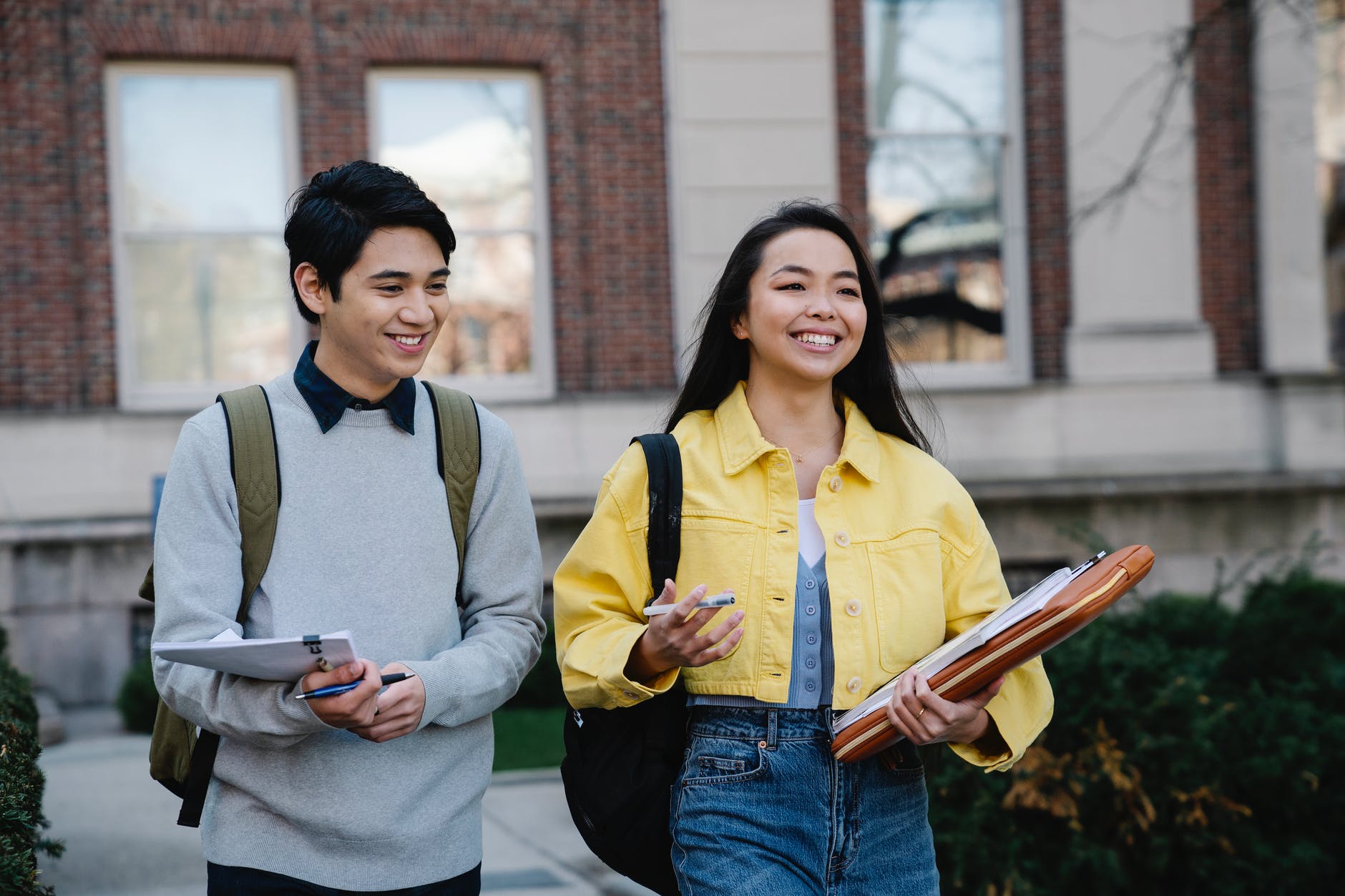 young man and woman walking together